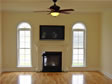 An elegant fireplace with marble surround in the living room of this Monmouth County, Oceanport, NJ modular home
